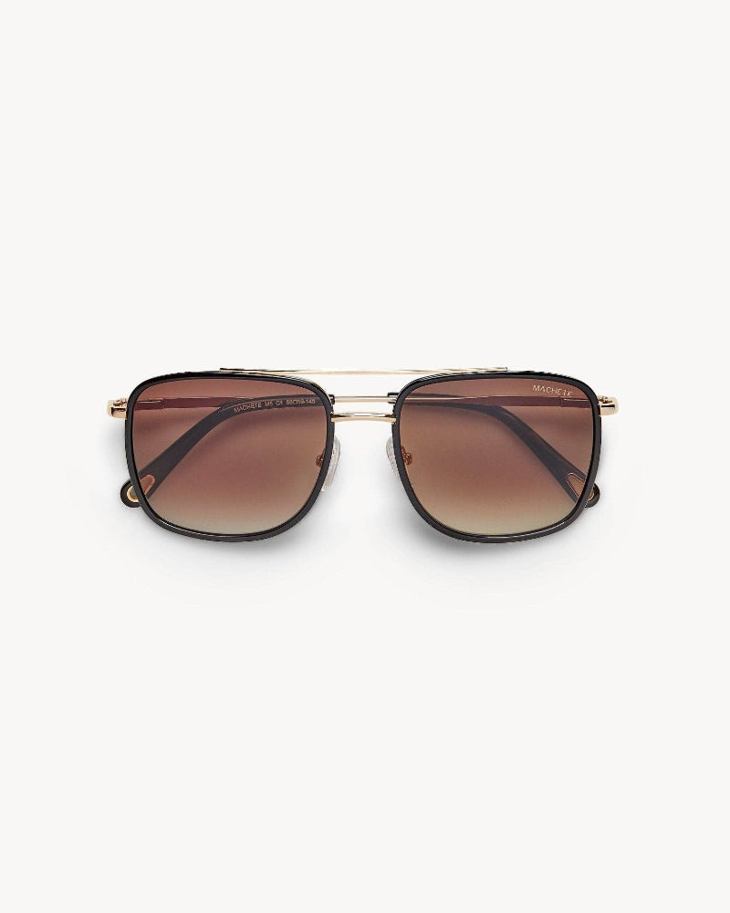 Sunglasses with gold frame and brown gradient lenses on a white background