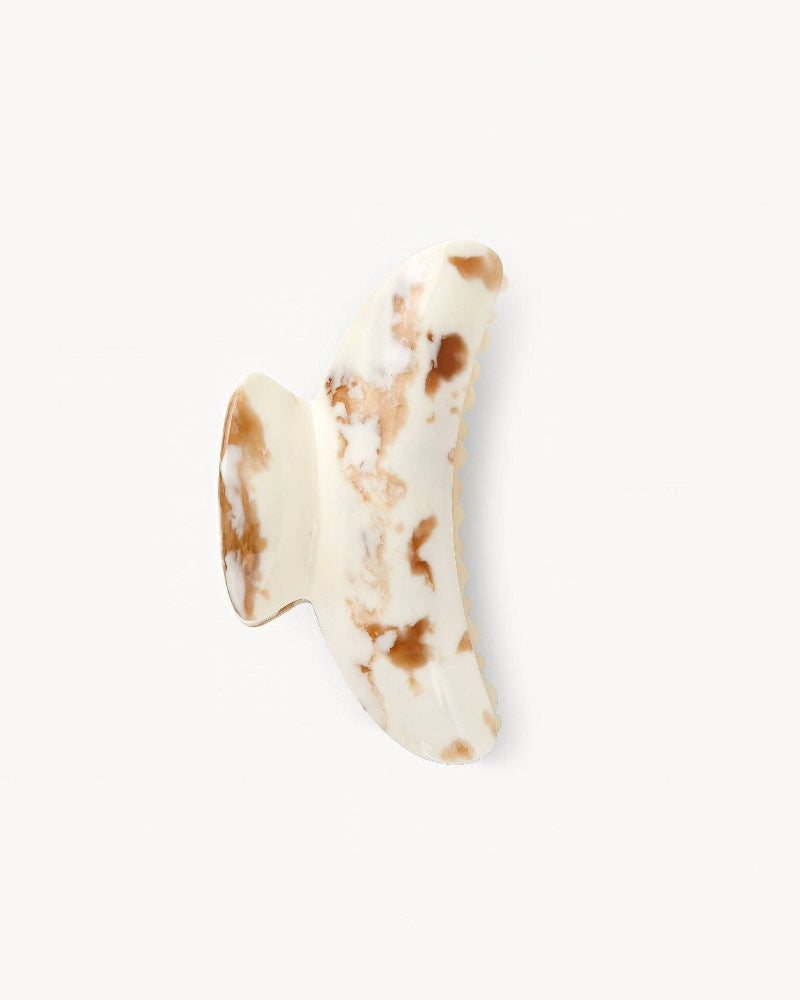 Decorative wall hook with brown and white marbled pattern on a white background