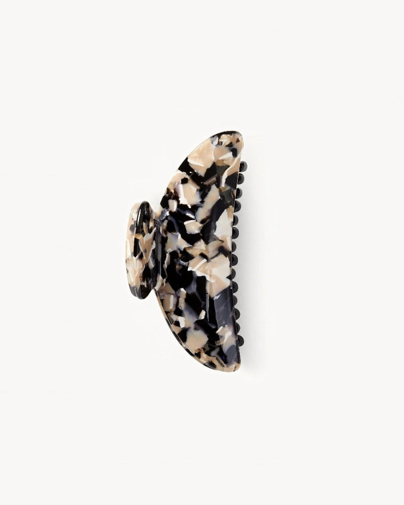 A double-walled, animal patterned hair claw made from Italian acetate, displayed on a white background.