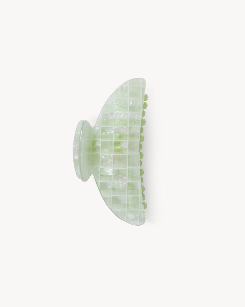 Mint Green checkered hair claw on a white background