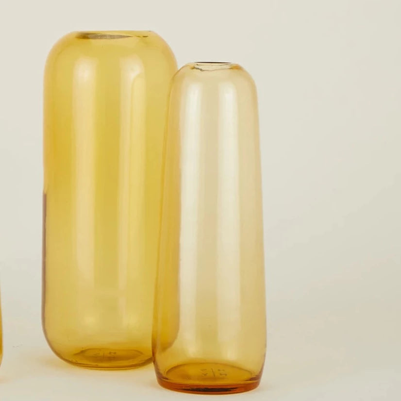 Handblown glass pill vase.