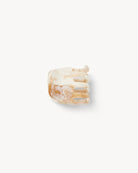 Beige hair clip on a white background