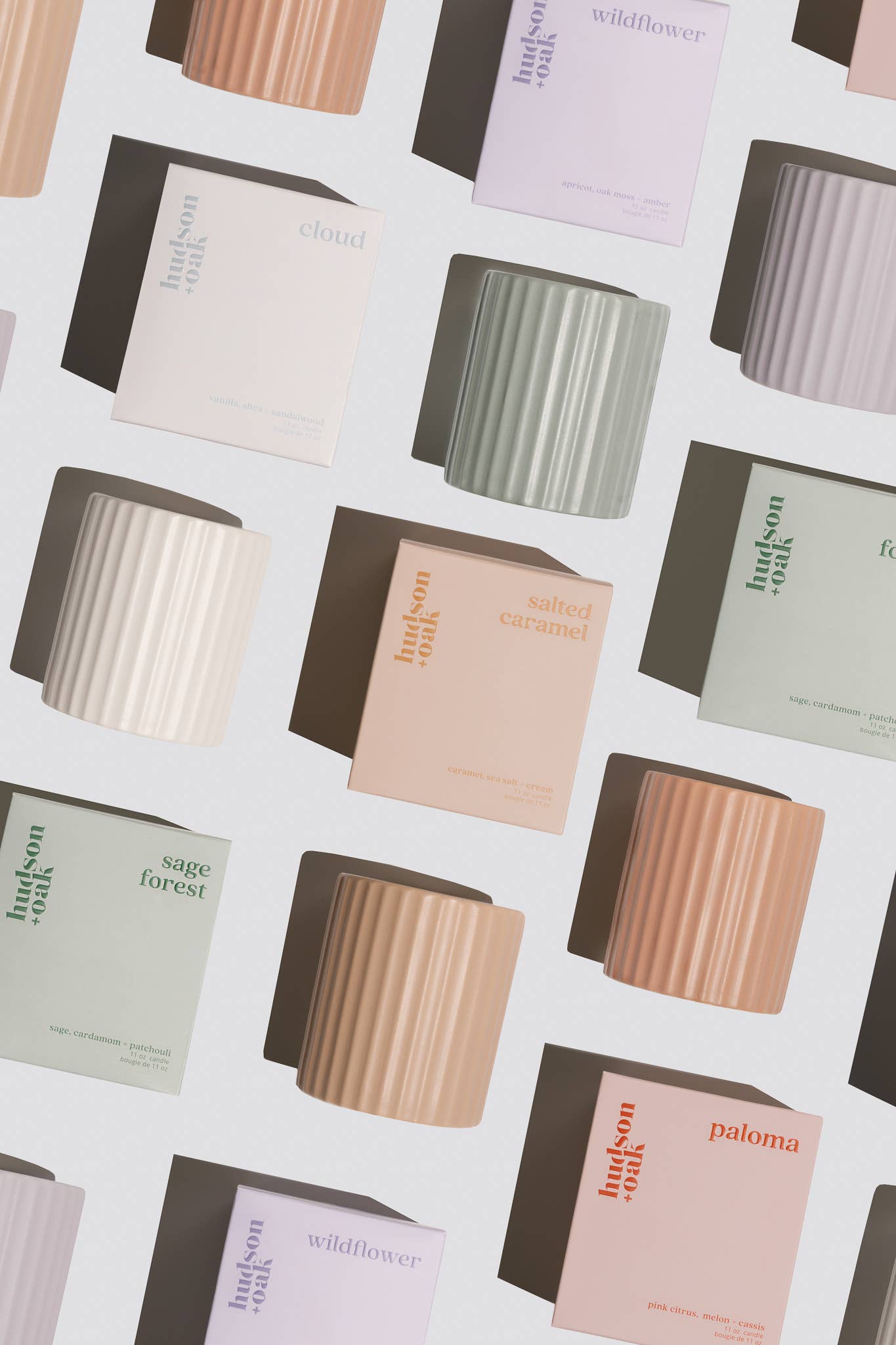 Pattern of Hudson Hawk candles and boxes on a light background