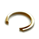 substantial brass cuff bracelet with a arching ridge detail