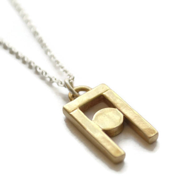 structural cast brass pendant necklace on 18 inch sterling silver chain 