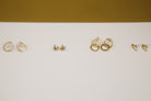 gold and sterling silver stud earrings circles and pebbles